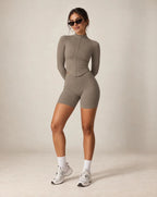 Taupe fitted zip-up yoga jacket with stand collar, long sleeves
