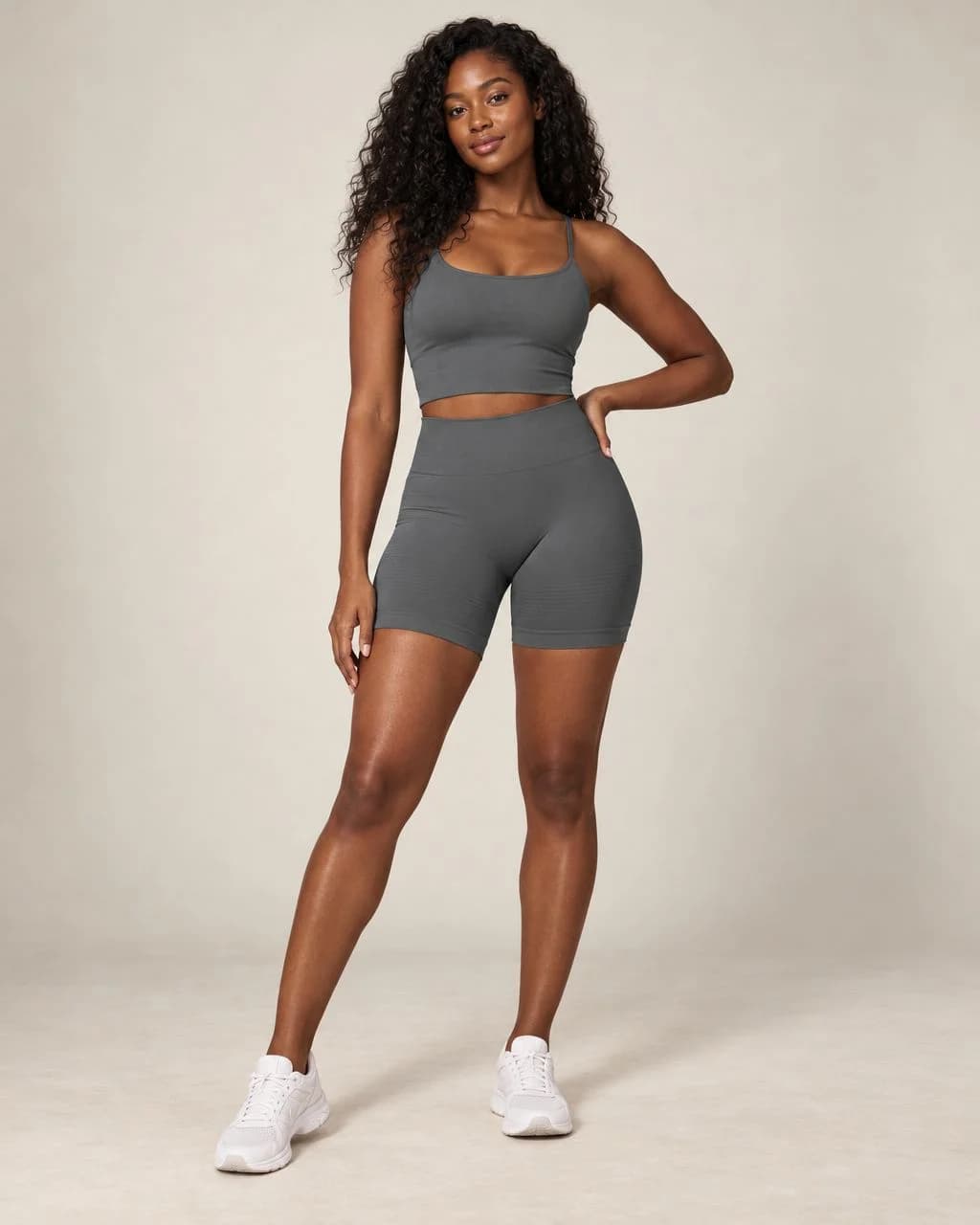 High-waist fitted yoga shorts, gray, seamless look with stretchy mid-thigh length.