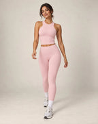 High-waist seamless yoga leggings in light pink with ankle-length legs and snug fit