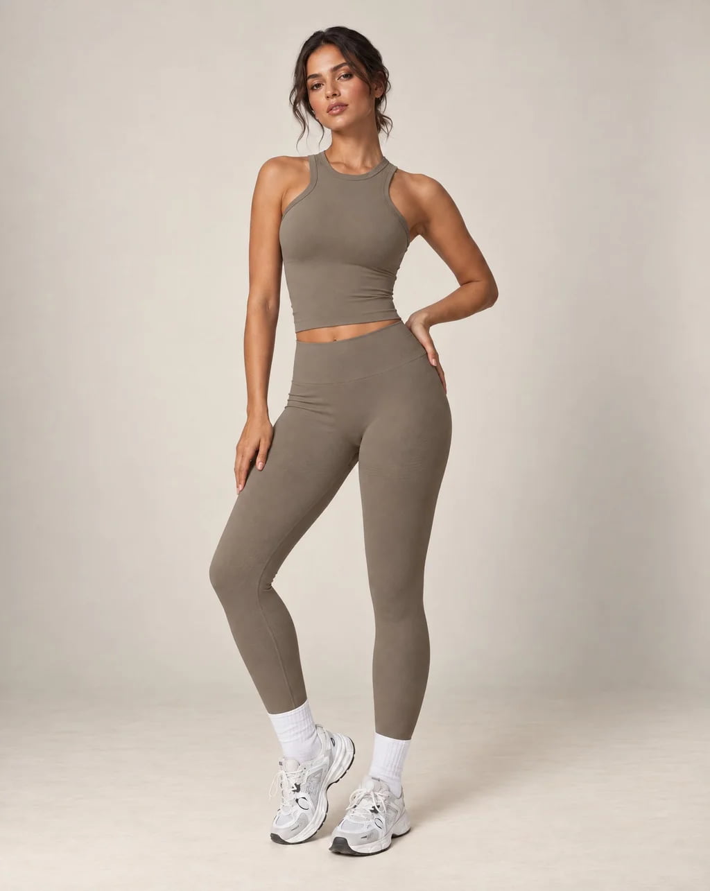 High-waist seamless yoga leggings in taupe gray with ankle-length legs and snug fit