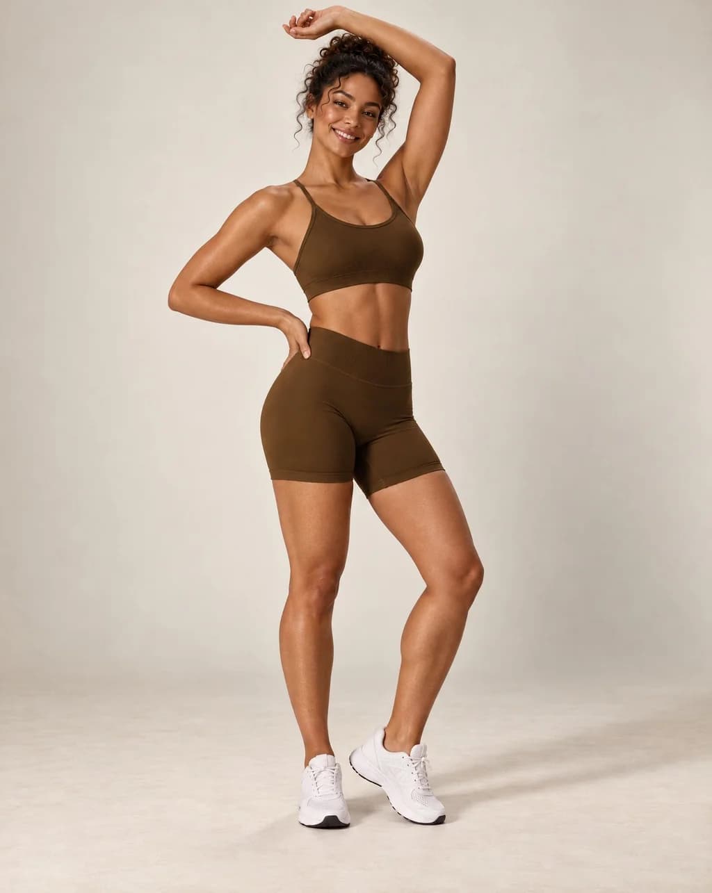 Brown cross-back sports bra and matching workout shorts set