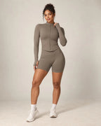 Velyrra Peak long-sleeve fitted zip-up yoga jacket, taupe with full zipper