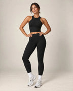 High-waist seamless yoga leggings in black with ankle-length leg openings and snug fit