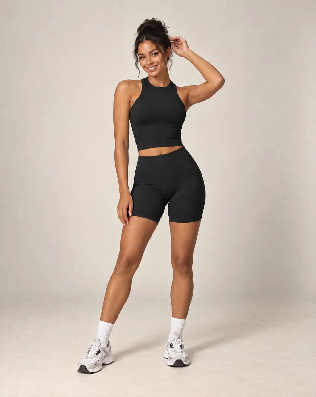 Black halter crop top and biker shorts set with high neckline