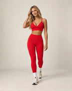 Red sports bra and high-waist leggings set with ankle length and white socks