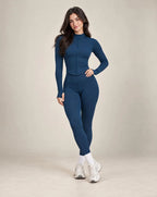 Women's deep blue zip-up yoga jacket and high-rise leggings set