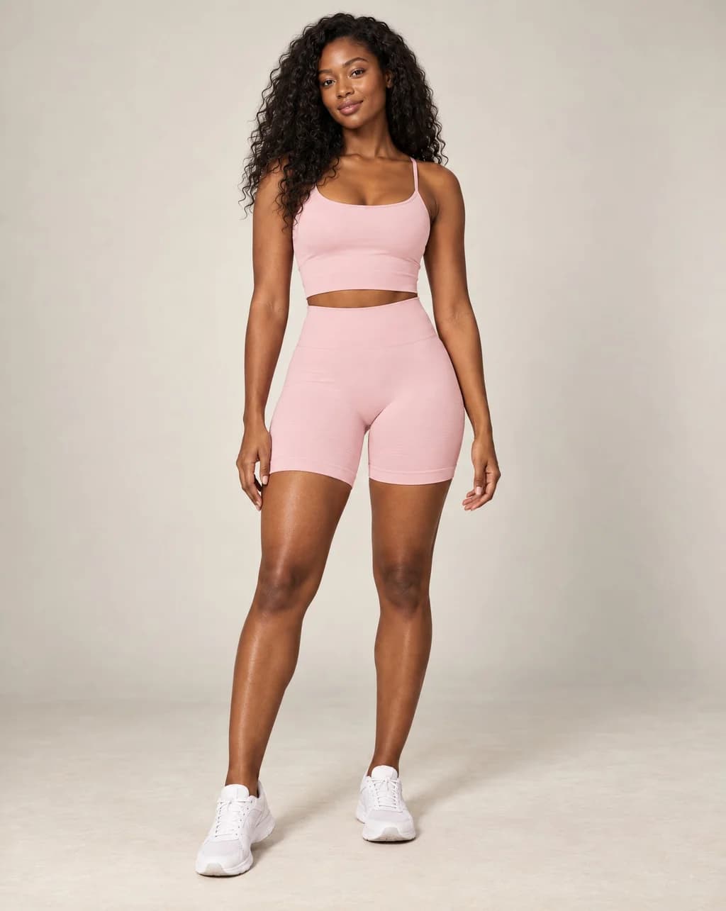 High-waist fitted yoga shorts, retro pink, smooth stretchy fabric with mid-thigh length.