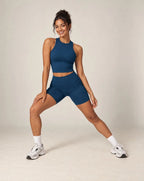 Blue halter crop top and biker shorts set with high neck