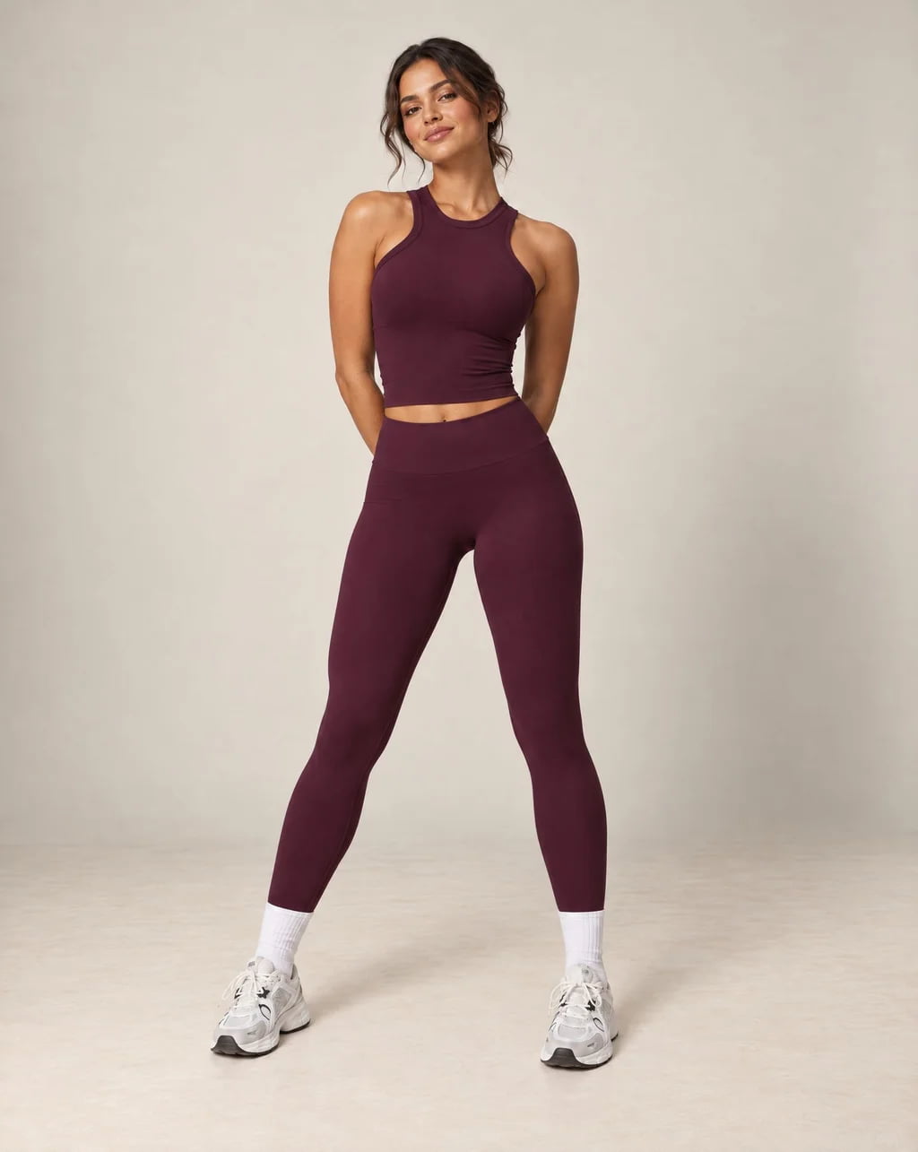 High-waist seamless yoga leggings in plum wine red with ankle-length legs and snug fit