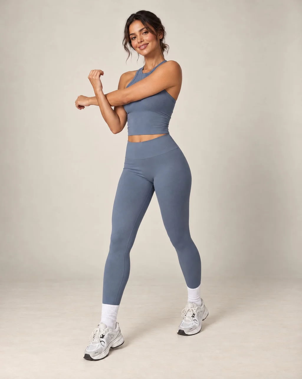 High-waist seamless yoga leggings in slate blue with ankle-length legs and smooth fit