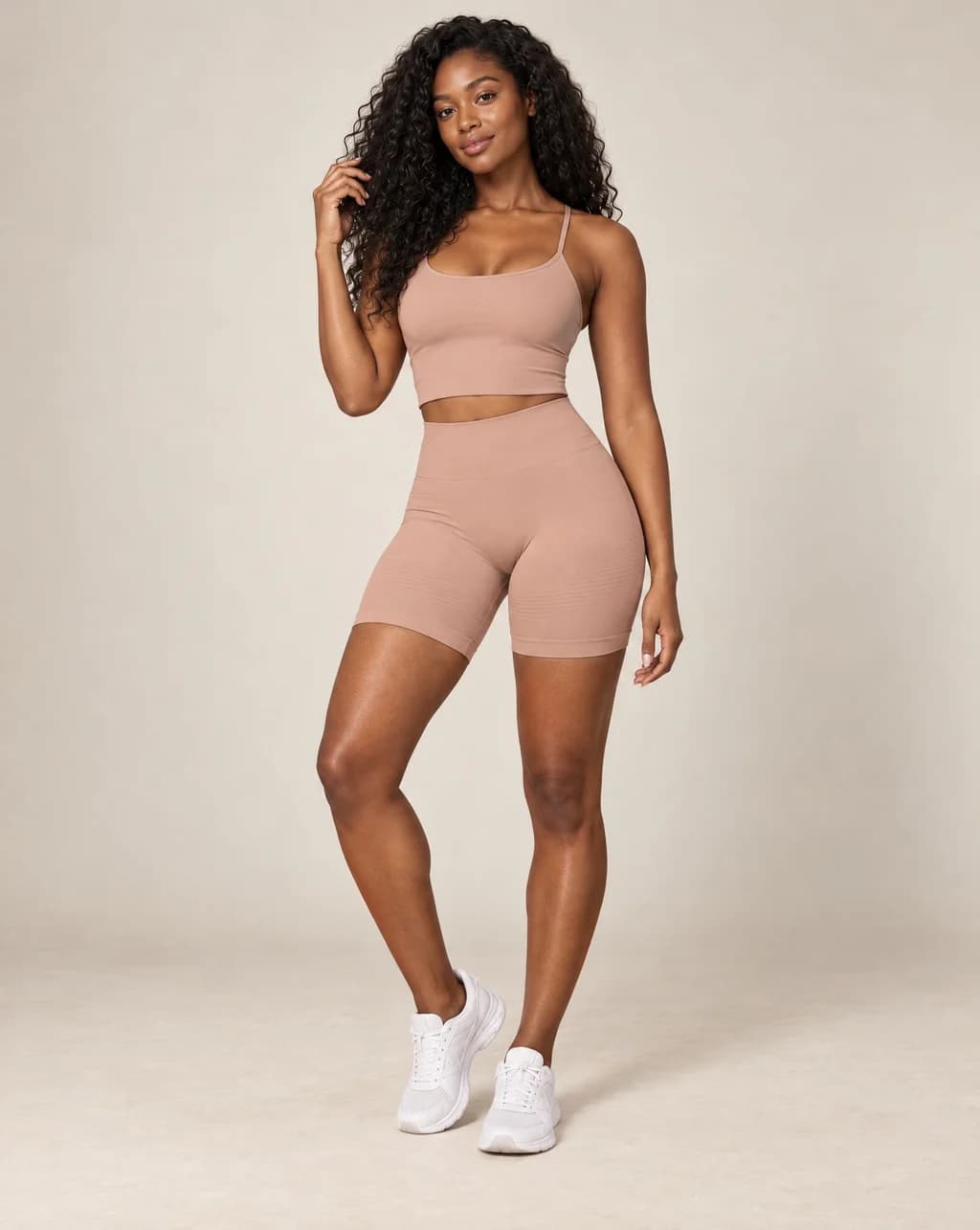 High-waist fitted yoga shorts, coffee beige, smooth stretchy fabric with mid-thigh length.