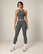 High-waist seamless yoga leggings in dark gray with ankle-length legs and snug fit