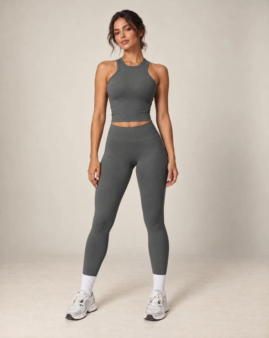 High-waist seamless yoga leggings in dark gray with ankle-length legs and snug fit