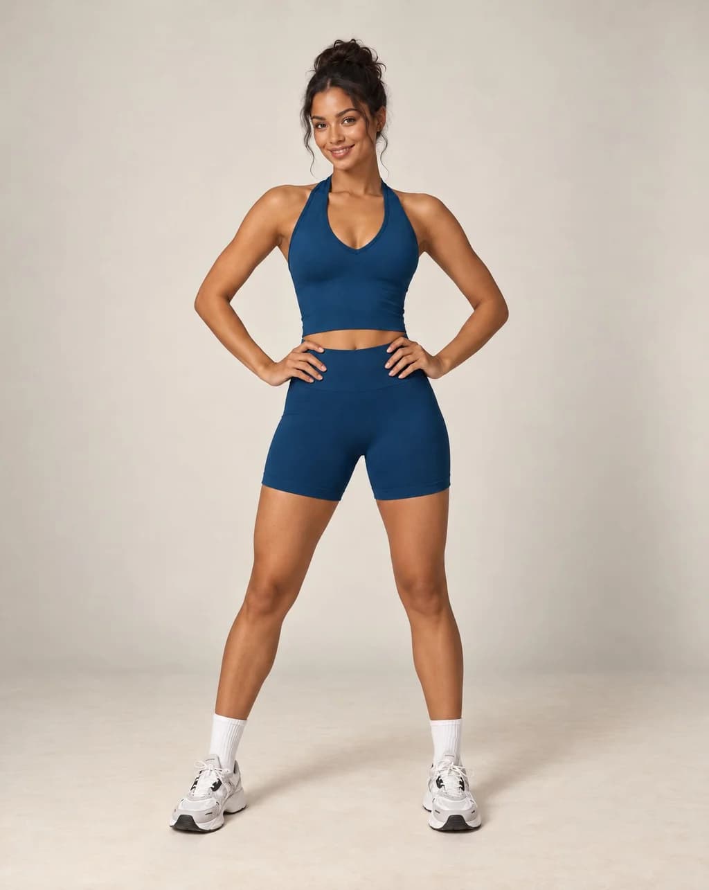 Blue halter crop top and biker shorts set with sleeveless high neck