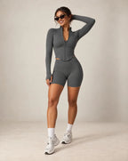 Dark gray fitted zip-up yoga jacket with stand collar, long sleeves