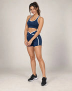 Women’s running shorts, dark blue with white contrast trim