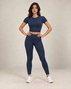 Women's fitted short-sleeve running shirt, dark blue crew neck.