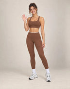 Brown colorblock high-waisted yoga pants with white waistband and ankle-length legs