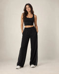 Black high-waisted relaxed straight-leg sweatpants with elastic waistband and side stripe
