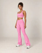 High-waisted flared active pants in rose pink, soft feel.
