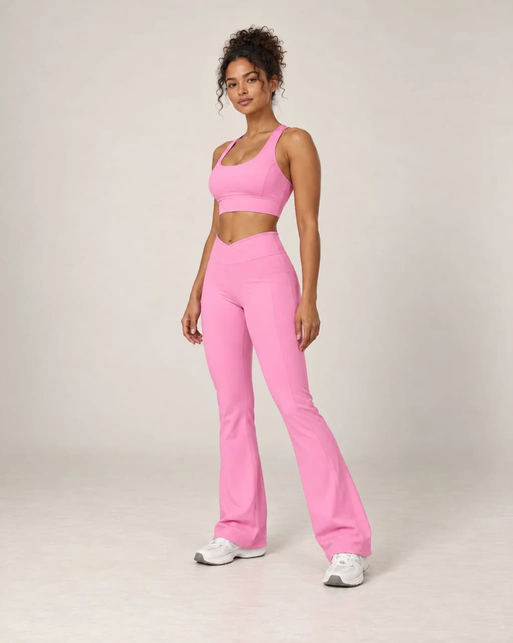 High-waisted flared active pants in rose pink, soft feel.
