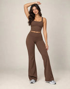 Brown high-waisted relaxed wide-leg track pants with flared ankle fit