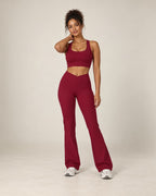 High-waisted flared active pants in cherry red, soft feel.