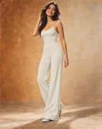 Off-white thin-strap wide-leg yoga jumpsuit with scoop neckline and flared legs